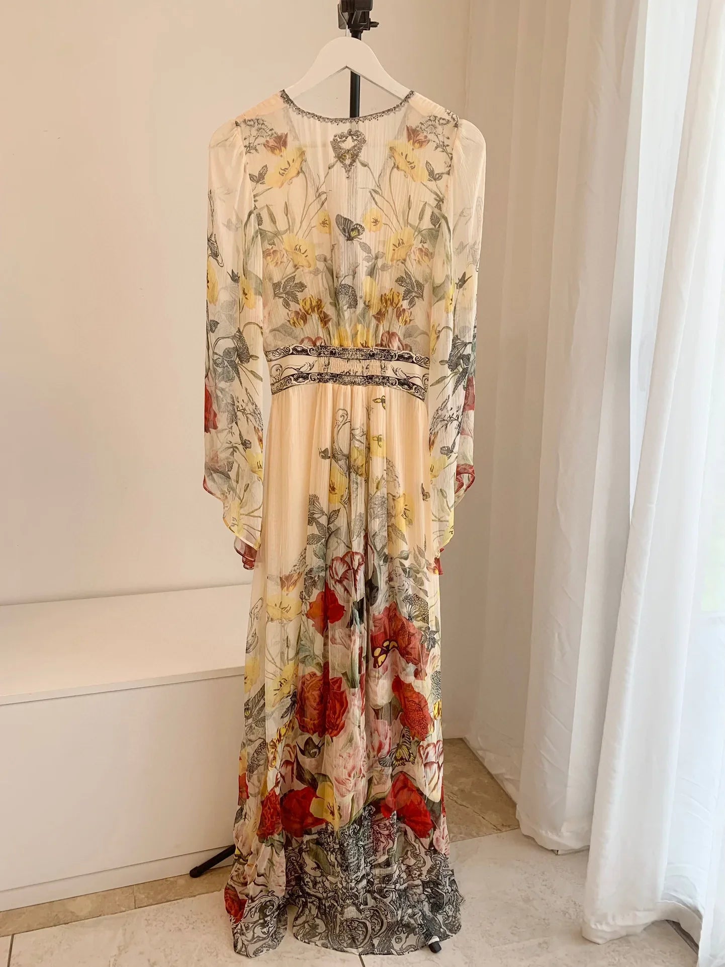 Boho Floral Maxi Dress | Flowing Silhouette | V-Neck with Tassel Accents | Elegant Resort Wear