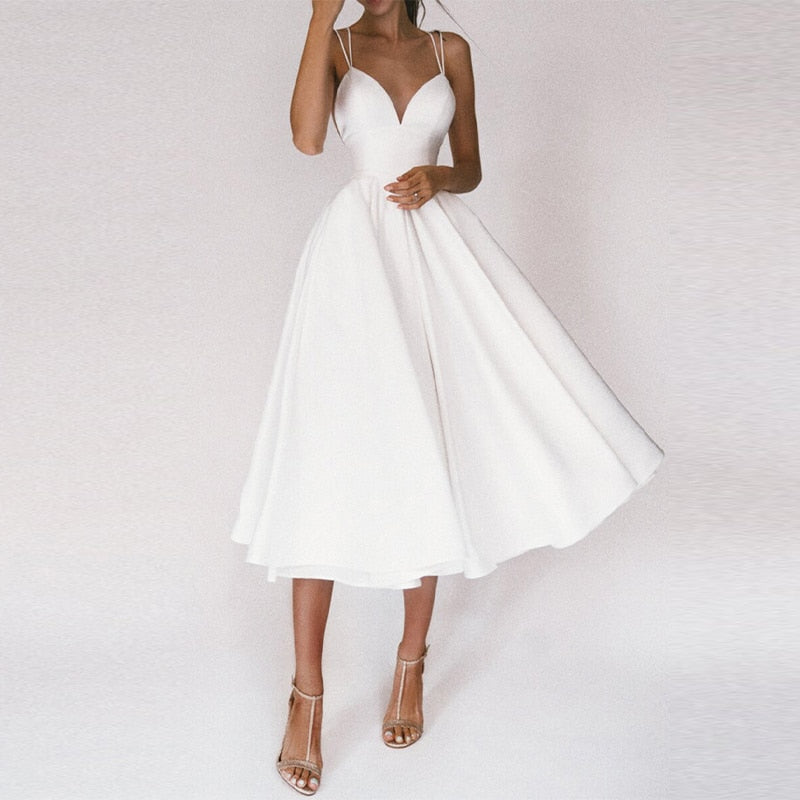 Deep V-Neck Red Gown | Spaghetti Strap Formal Dress | Flowy Floor-Length Silhouette