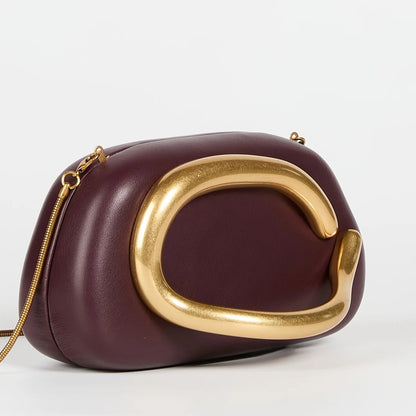 Glossy Vegan Leather Clutch | Statement Gold Hardware